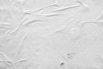 Obraz premium Blank white crumpled and creased paper poster texture background