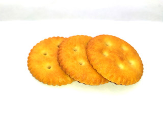 Stack of sweet meal digestive biscuits isolated on white