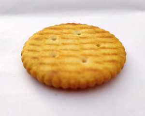 Stack of sweet meal digestive biscuits isolated on white