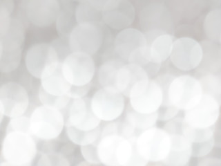 White and silver blur abstract background with bokeh lights for background 