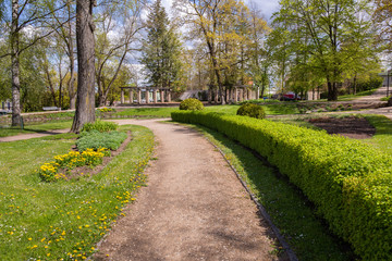 City, Cesis, Latvia. Old historic park in spring with greenery.