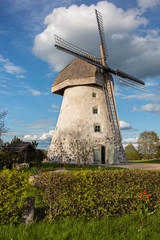 Cit Araisi, Latvia. Old historic  windmill and nature.