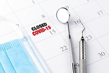 Dentist Closed due to COVID-19 Coronavirus Outbreak Lockdown Appointment in Calendar with Dental Tools.