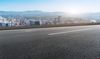 Fototapeta premium Urban road ground and architectural landscape