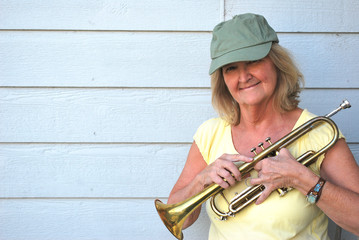 Mature female trumpet player.
