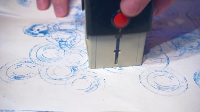 stamping a paper document.close-up.business concept.