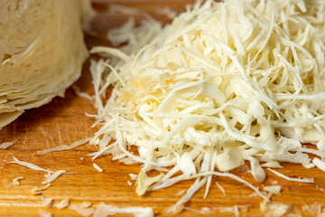 .Cabbage. Sliced &acirc;&euro;&lsaquo;&acirc;&euro;&lsaquo;white cabbage on a wooden board close-up. Vegan food.