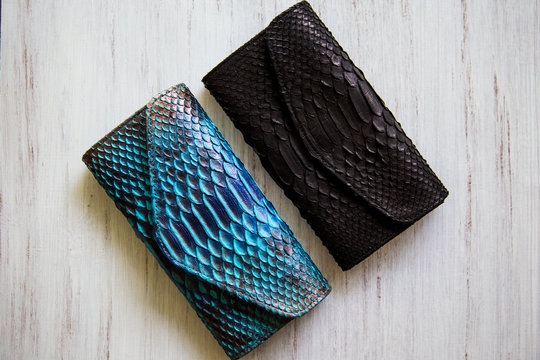 Four different tones of trendy green painted snake python skin surface