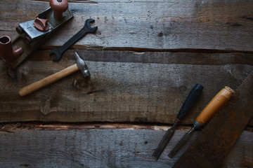 old tools on wooden background