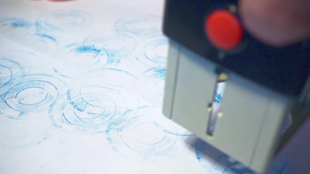 stamping a paper document.close-up.business concept.