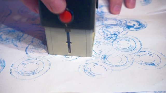 stamping a paper document.close-up.business concept.