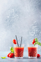 Vegan tomato juice with basil and peppe