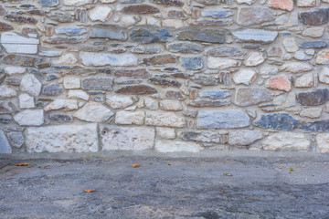 Castle rock architecture stone wall; background and texture with floor