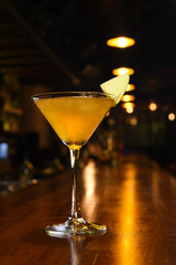 orange colored cocktails bar and restaurant in glass