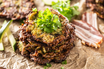 Crunchy zucchini pancakes with bacon parsley herbs and other ingredients