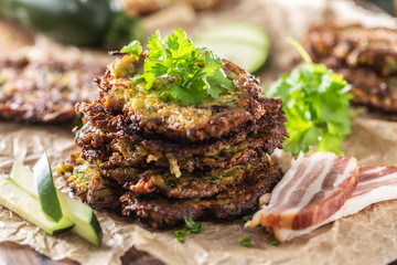 Crunchy zucchini pancakes with bacon parsley herbs and other ingredients