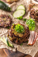 Crunchy zucchini pancakes with bacon parsley herbs and other ingredients