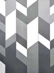 abstract background concept,close up modern gray pattern,wallpaper with design for decorative of building,grey concrete surface with one part of construction modern architecture in city