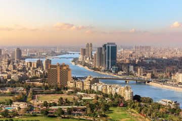 The Nile and the skyscrappers of Cairo, Egypt - obrazy, fototapety, plakaty
