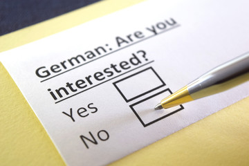 Fototapeta premium One person is answering question about german.