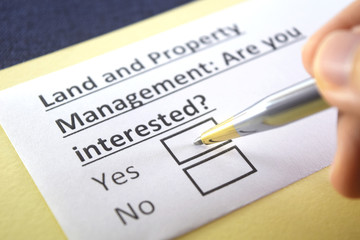 Fototapeta premium One person is answering question about land and property management.