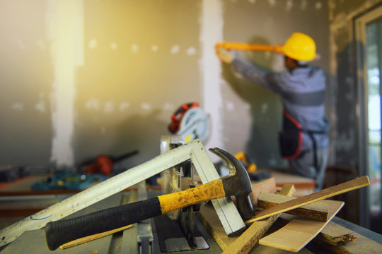A desk of contractor engineers.collection of working tools on a workbench,Carpenter tools &acirc;&euro;&ldquo; A carpenters bench with various tools