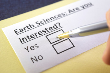 Obraz premium One person is answering question about earth sciences.
