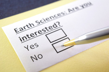 Obraz premium One person is answering question about earth sciences.