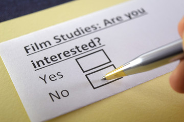 Obraz premium One person is answering question about film studies.