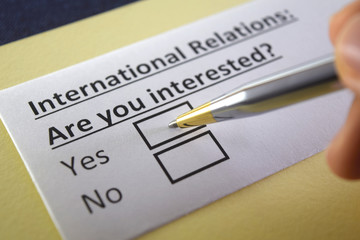 Obraz premium One person is answering question about international relations.