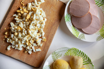 boiled egg, boiled potatoes, boiled sausage