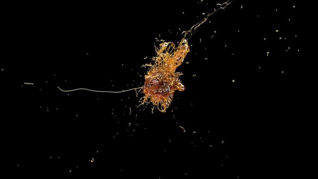 Drops of beer collide and form a spray Fluid design. 4k