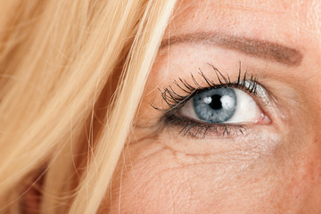 Right eye of blond woman