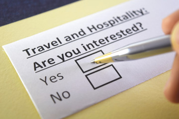 Fototapeta premium One person is answering question about travel and hospitality.