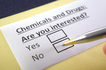 Obraz premium One person is answering question about chemicals and drugs.