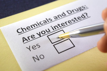 Fototapeta premium One person is answering question about chemicals and drugs.