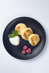 Healthy food on a white plate and a white background.