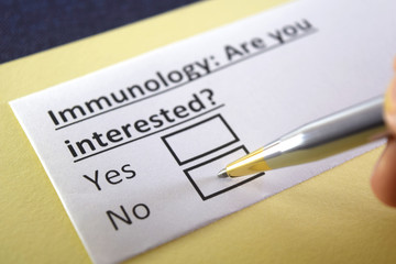 Obraz premium One person is answering question about immunology.