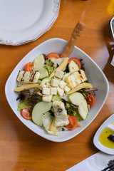 avocado, tomato, lettuce, green apple, mixed salad ready for presentation