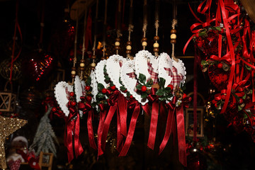 Christmas tree ornament decoration red ribbons and cute little angels for hanging in the tree