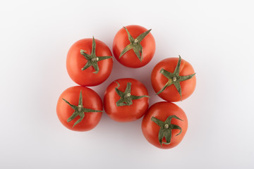Ripe Fresh Cherry Tomatoes on Branch Isolated on White Background