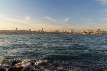 Fototapeta premium View of the Taksim district of Istanbul from the Bosphorus at sunset. Turkey