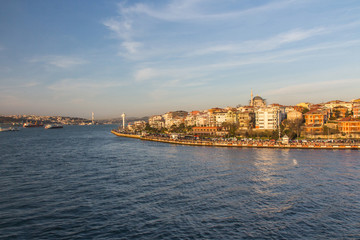 View of the Uskudar district of Istanbul from the Bosphorus at sunset. Turkey