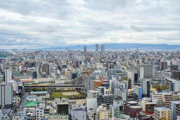 Fototapeta na wymiar 大阪　都会の景色と遠くに見える海 