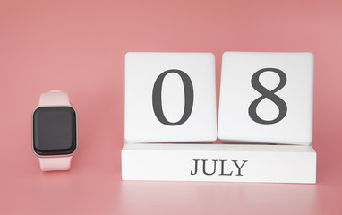 Modern Watch with cube calendar and date 08 july on pink background. Concept summer time vacation.