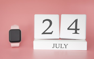 Modern Watch with cube calendar and date 24 july on pink background. Concept summer time vacation.