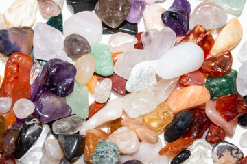 Crystal Stone Alternative Lifestyle Healing Chips in Quartz and Amethyst on White Background