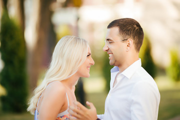 Obraz premium woman with her husband walking around the city, dressed neatly