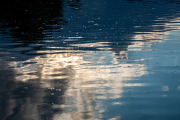 Cloud formations in the refleciton.