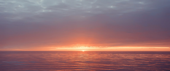 Naklejka na ściany i meble abstract sunset on the lake, landscape water and sky, blurred view freedom nature concept